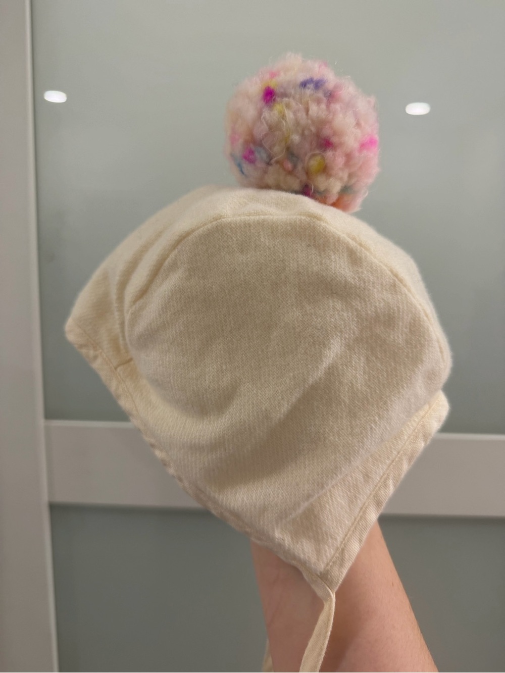 Briar Baby Bonnet with wool and rainbow Pom